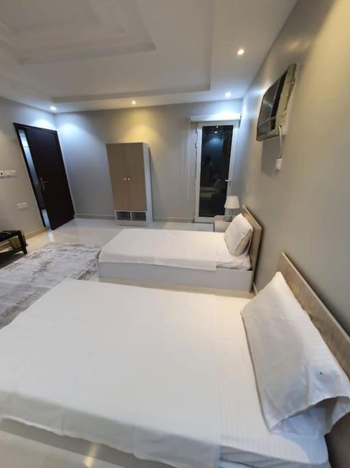 Alkhuzama Apartment