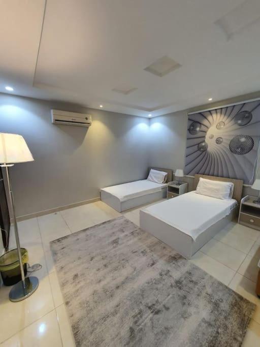 Alkhuzama Apartment *