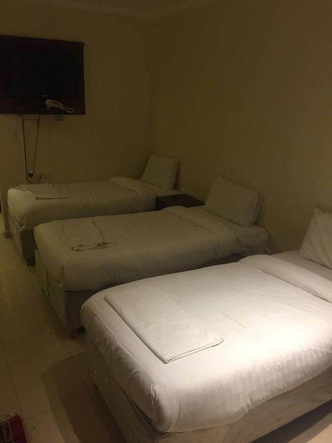 Hotel فندق الخلفاء توصيل للحرم
